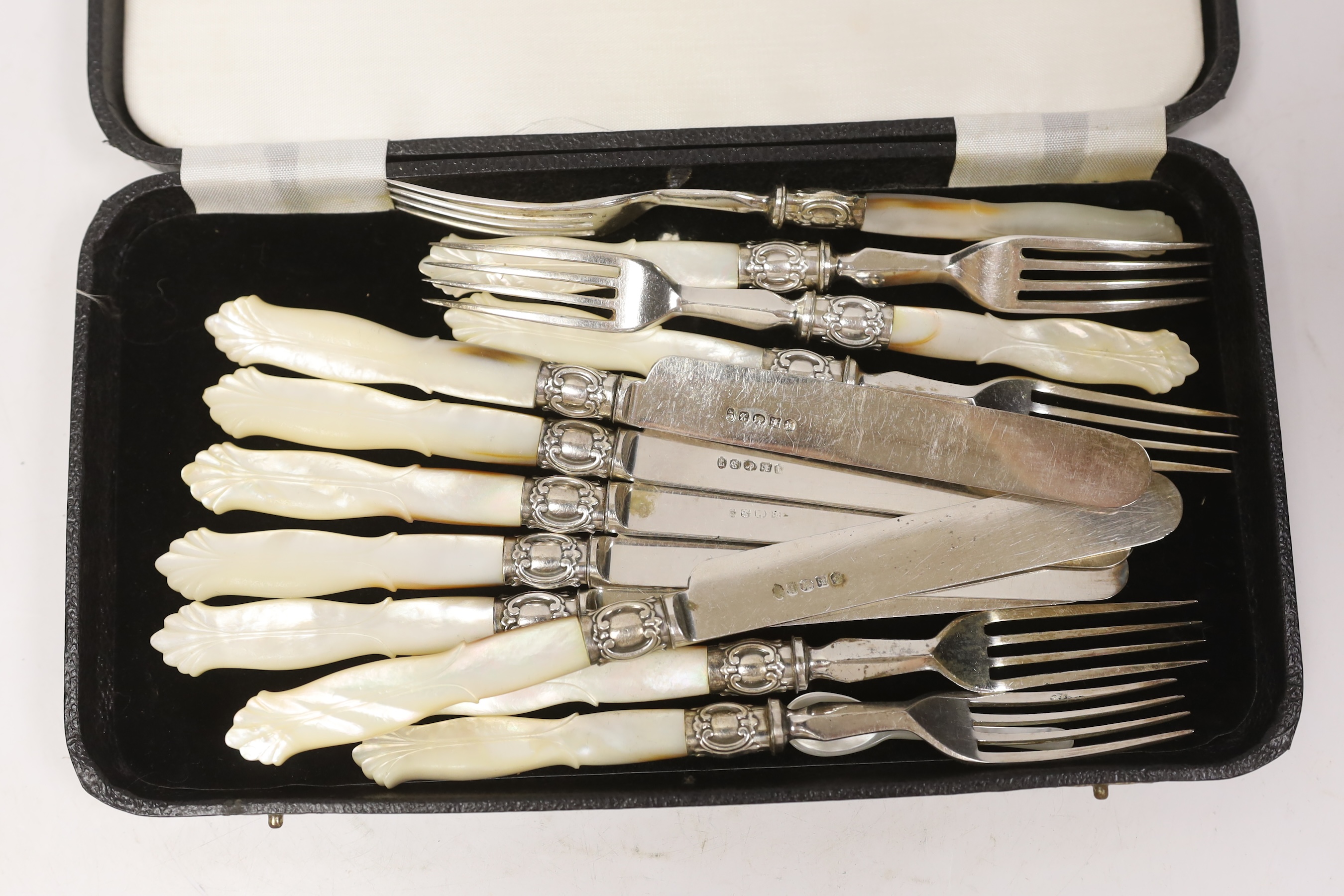 A cased set of plated fruit knives and forks